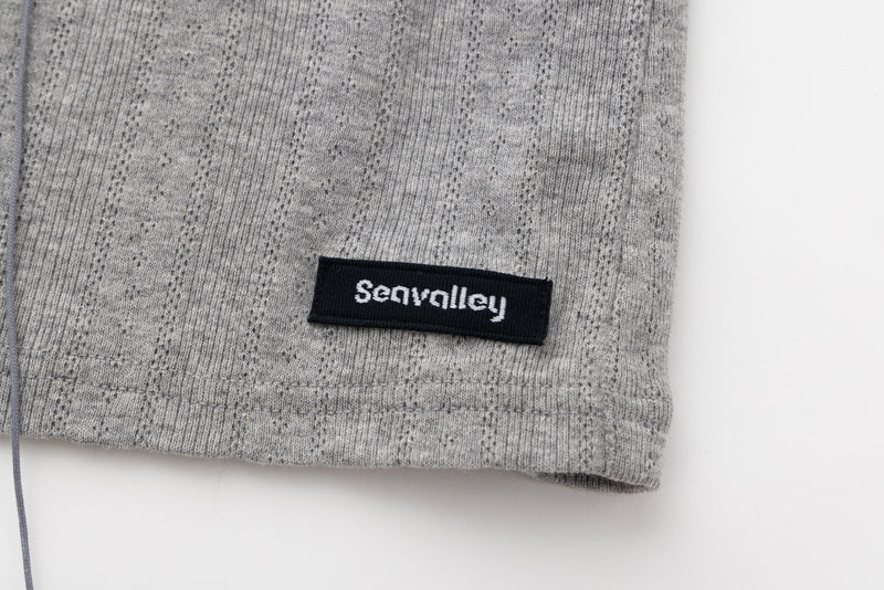 SEA EYELET RIBBED SLEEVELESS CARDIGAN