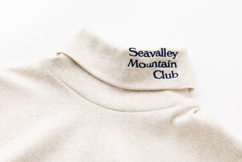 SEA  “Seavalley Mountain Club”  CIRCULAR RIB TURTLE NECK TOP